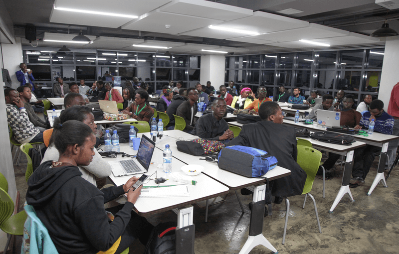 A participant working on a laptop during a Health Meets Tech session