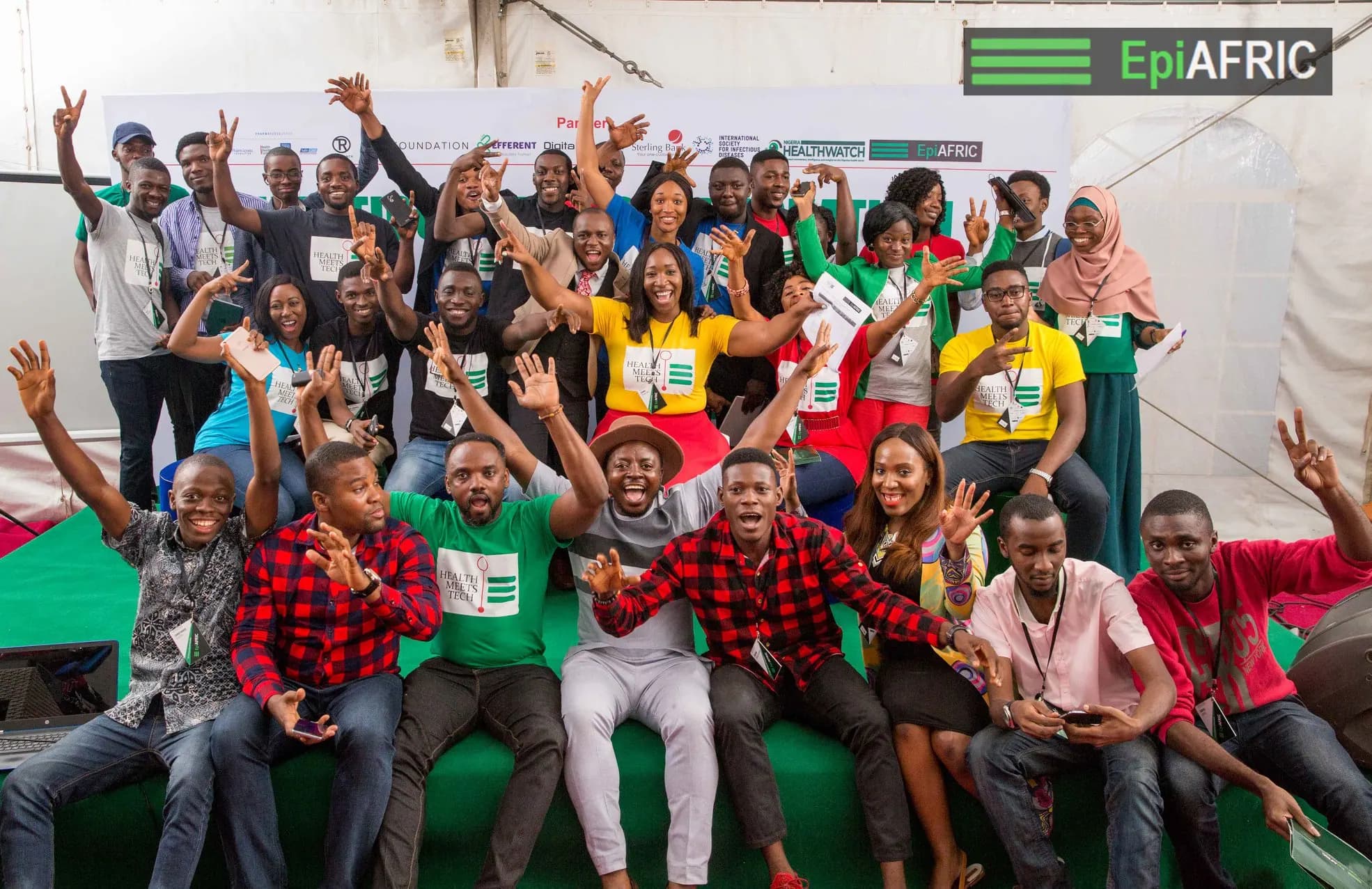 A large group of health and technology innovators gathered for a closing photograph