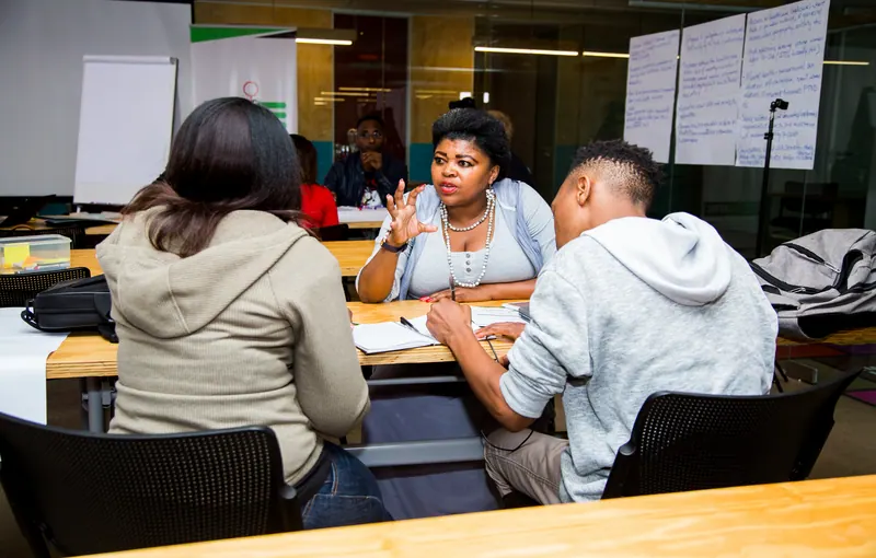 A participant concentrating on a collaborative design task