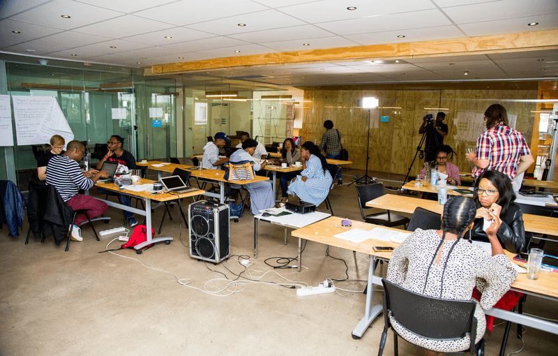 A participant speaking during a Health Meets Tech workshop